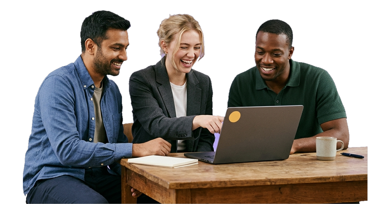 Three colleagues at a desk laughing as they look at a laptop together, reviewing an integration.